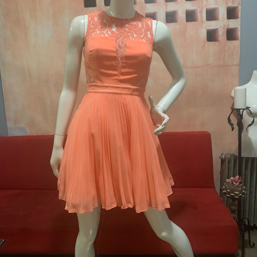 Bebé orange lace fit and flare pleated dress